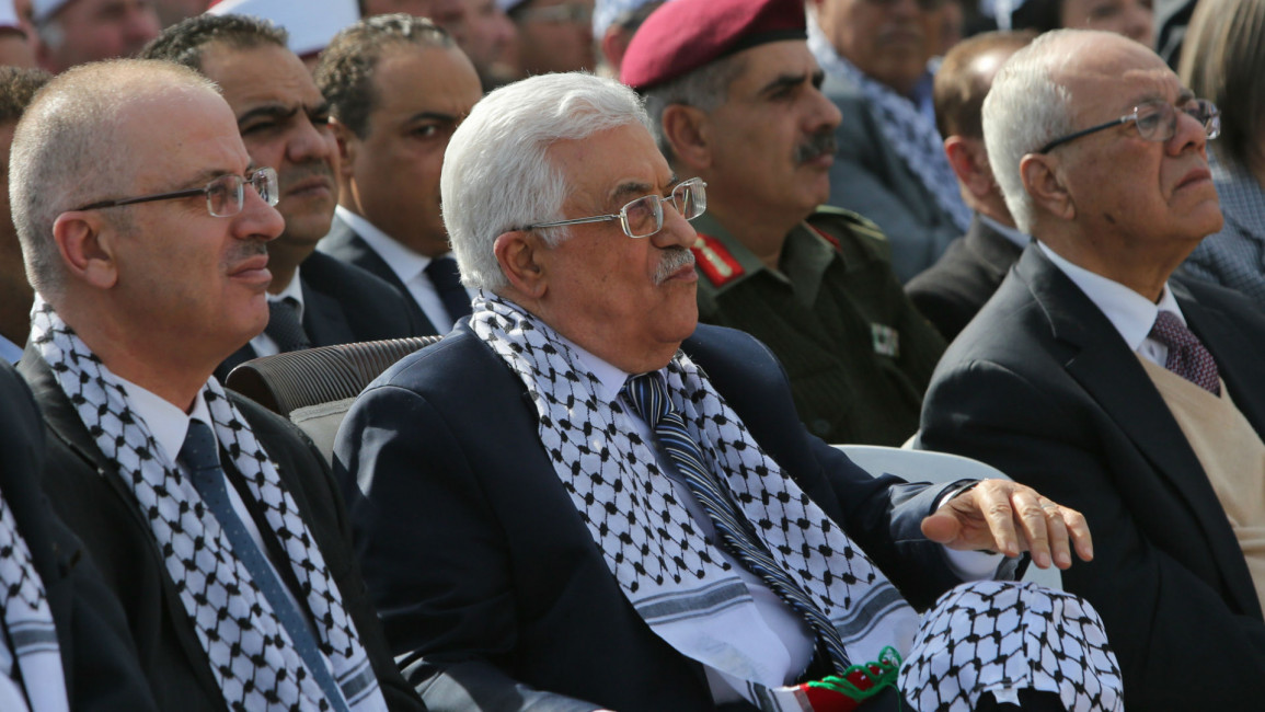 rami hamdallah mahmoud abbas palestine plo afp