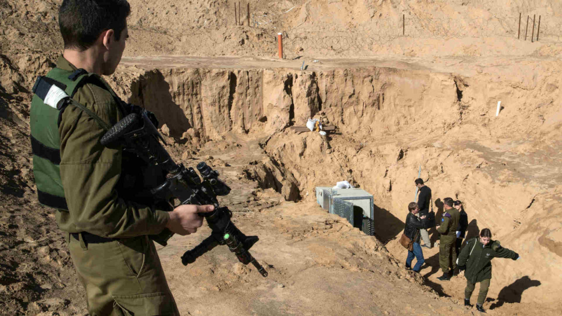 IDF soldier near entrance of Gazan tunnel