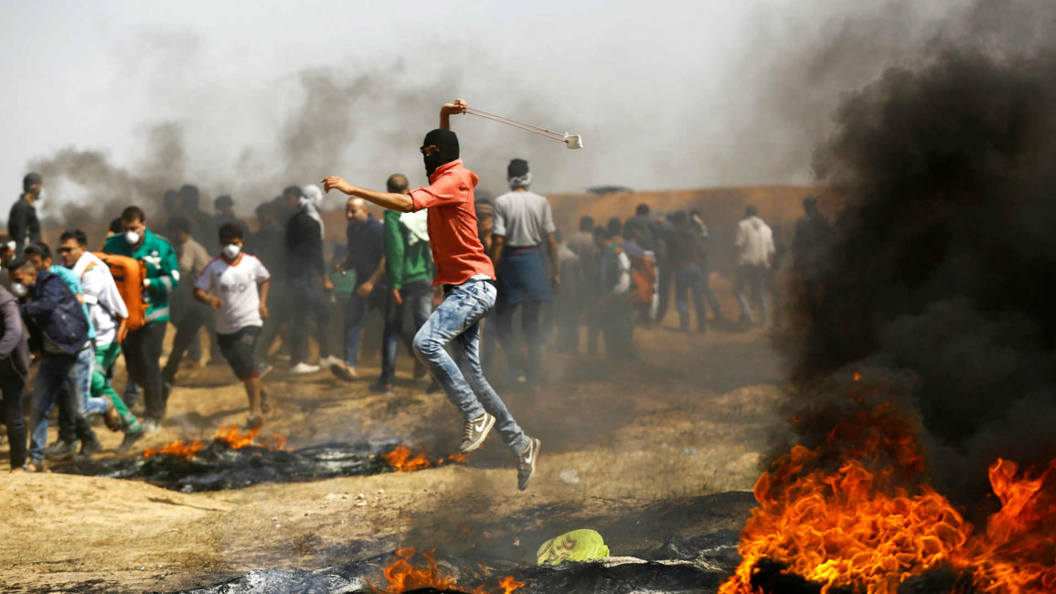 Palestinian wields a slingshot