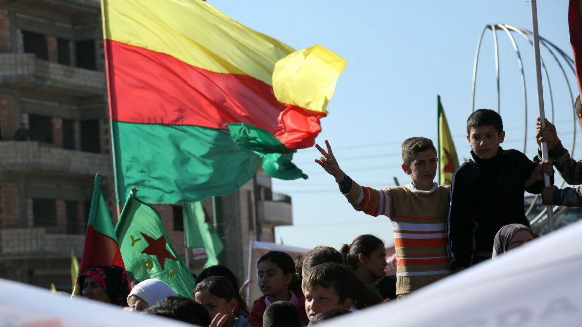 Syria Kurd flag Getty