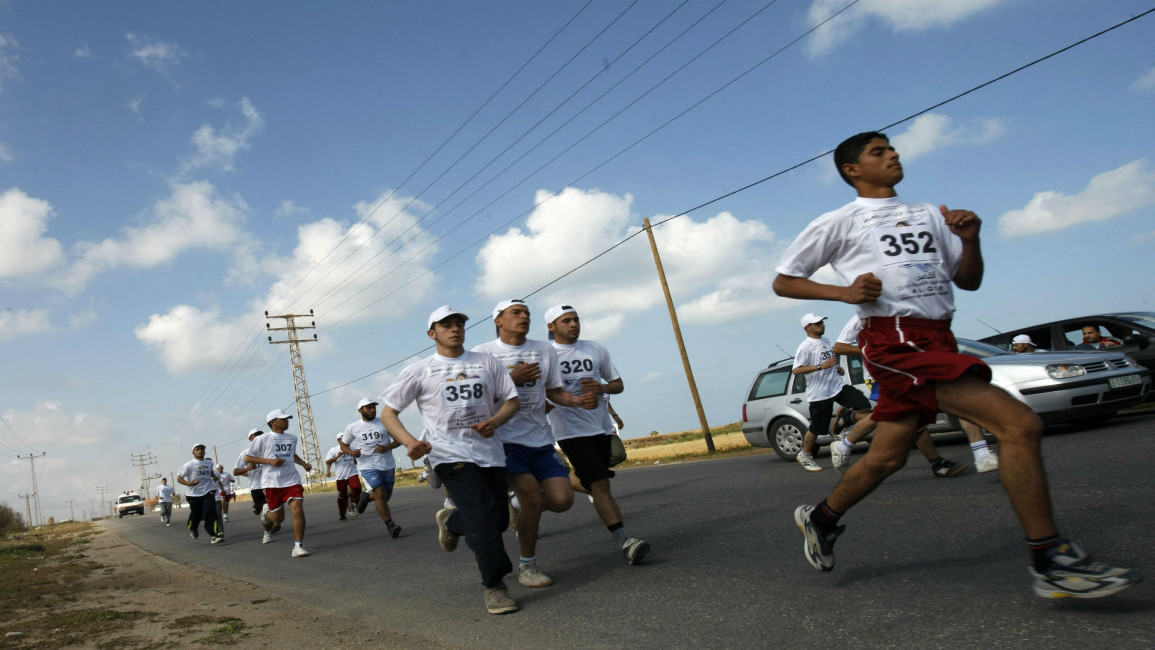 Palestinian runners AFP