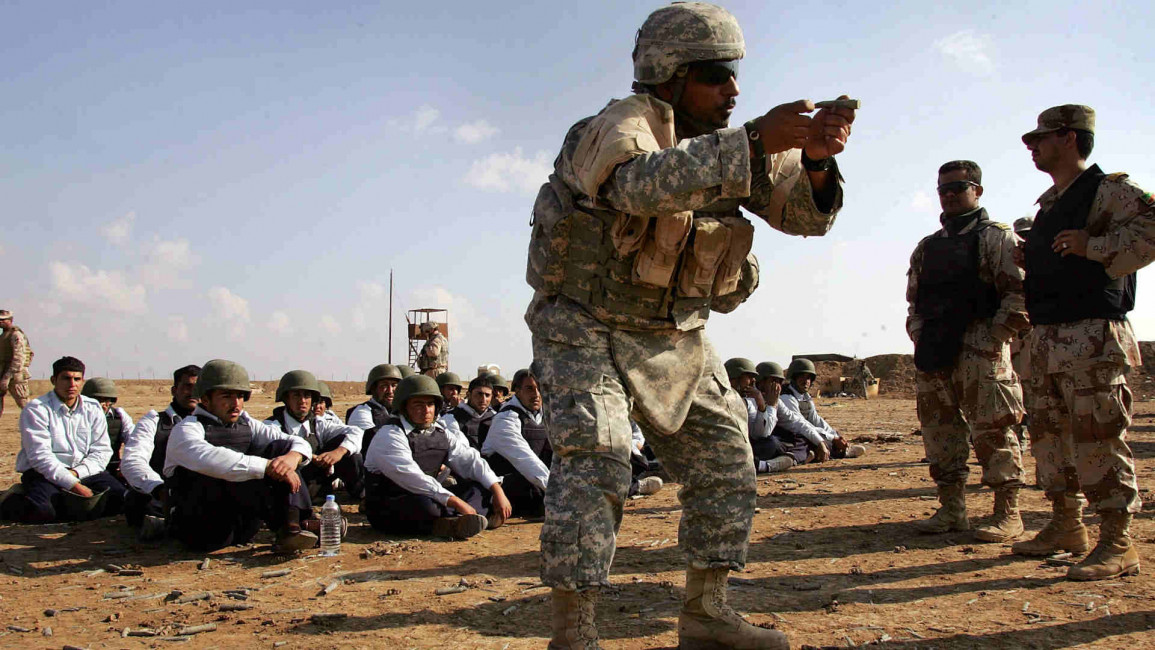 US Army trains Iraqi police cadets at firing range