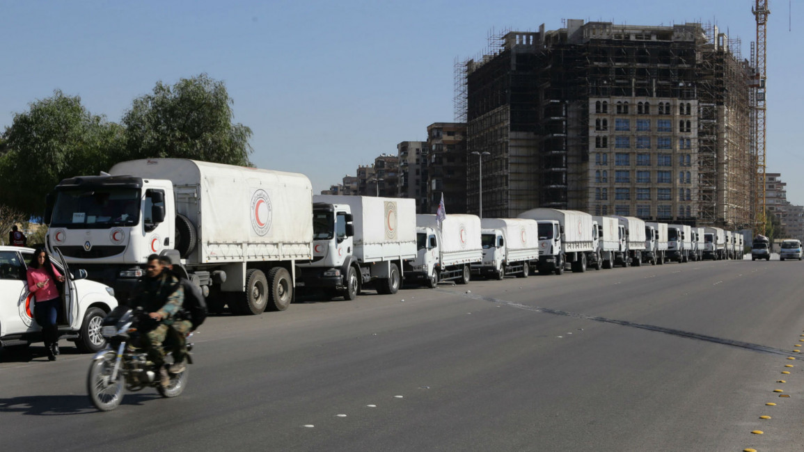 Syria aid trucks [AFP]