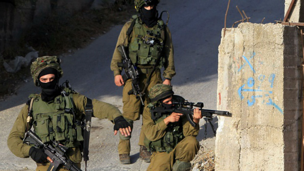 Israeli soldiers [AFP]