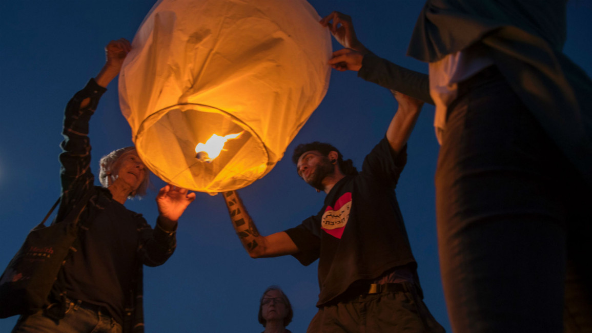 Gaza Israeli peace activists lantern 5 AFP