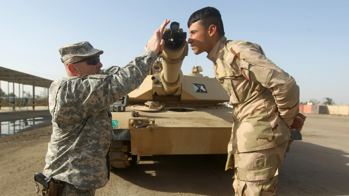 US soldier training Iraqi soldier