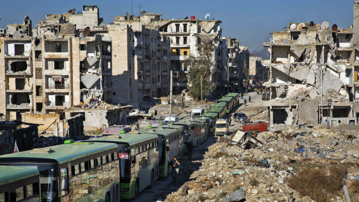 Evacuation buses in Aleppo [AFP]