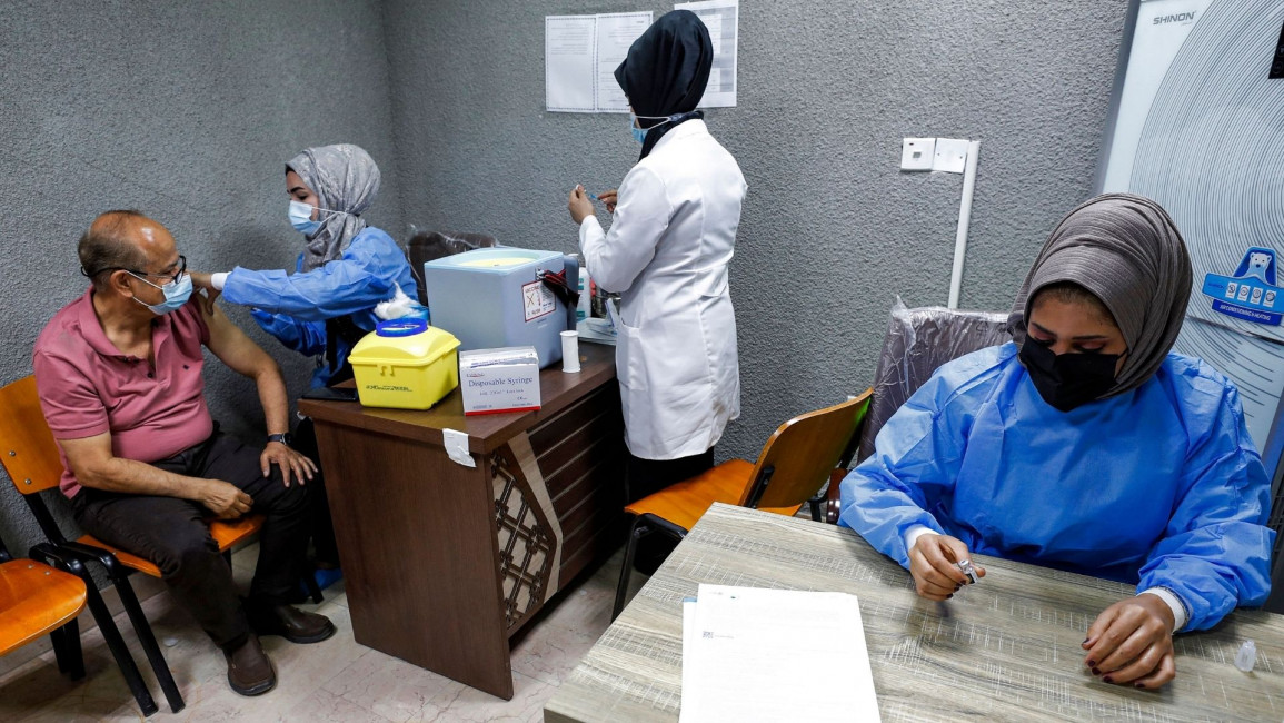 Iraq vaccine [AFP]
