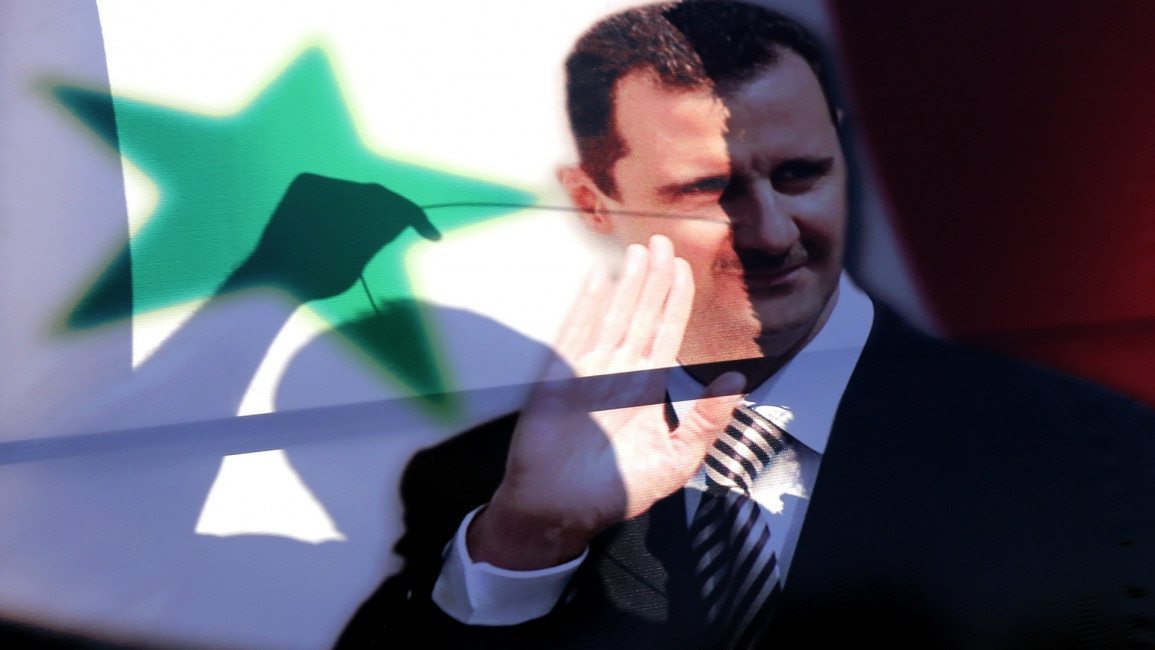 Assad poster