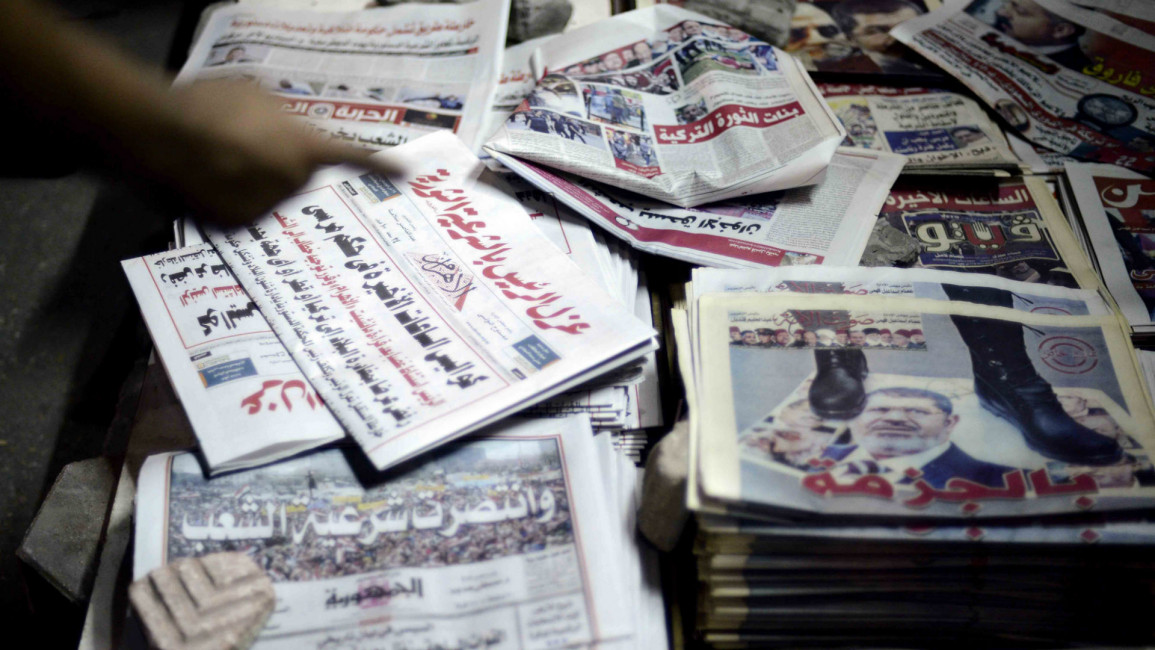 Egyptian newspapers report Morsi's fall