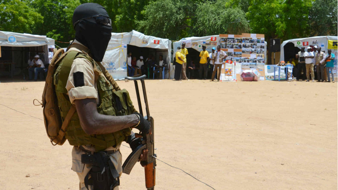 Nigerian soldier stands guard at IDP camp