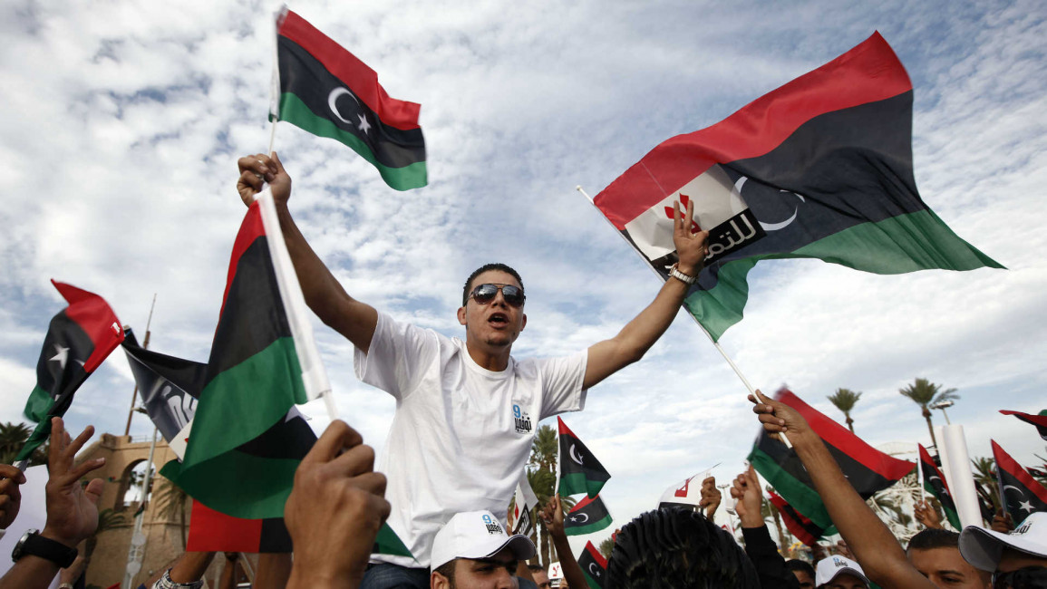 Libya flags man Anadolu