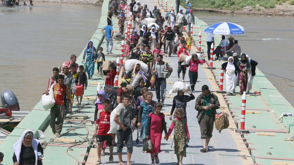 Yazidis Iraq fleeing AFP Englishsite