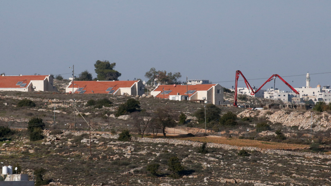 Settlement construction [AFP]