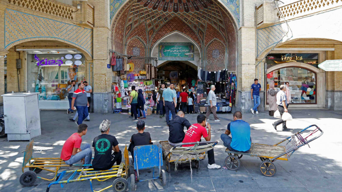 Tehran bazaar workers - getty