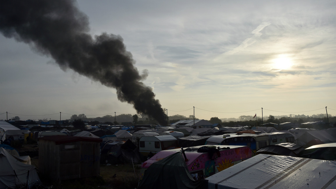 Calais camp flames