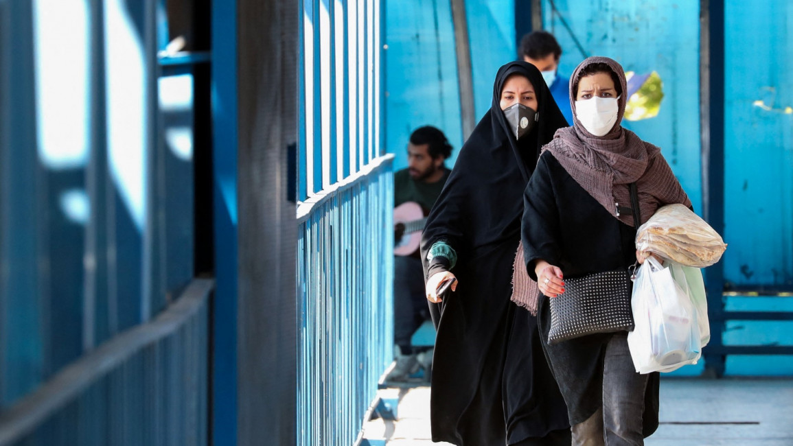 Iran Covid masks [AFP/Getty]
