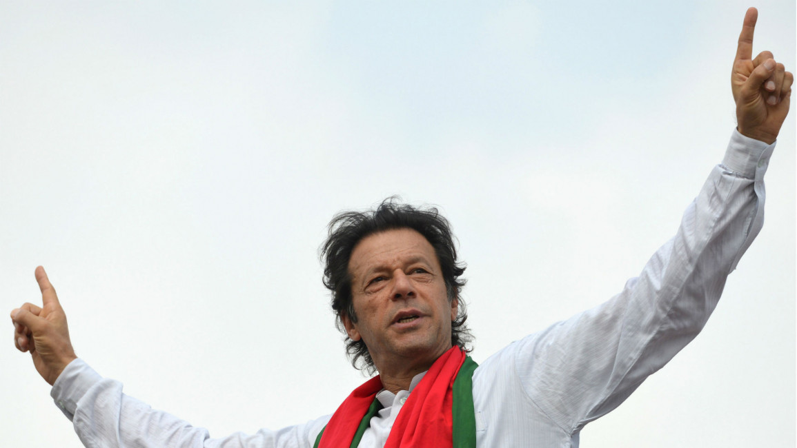 Imran Khan speaks to supporters at rally