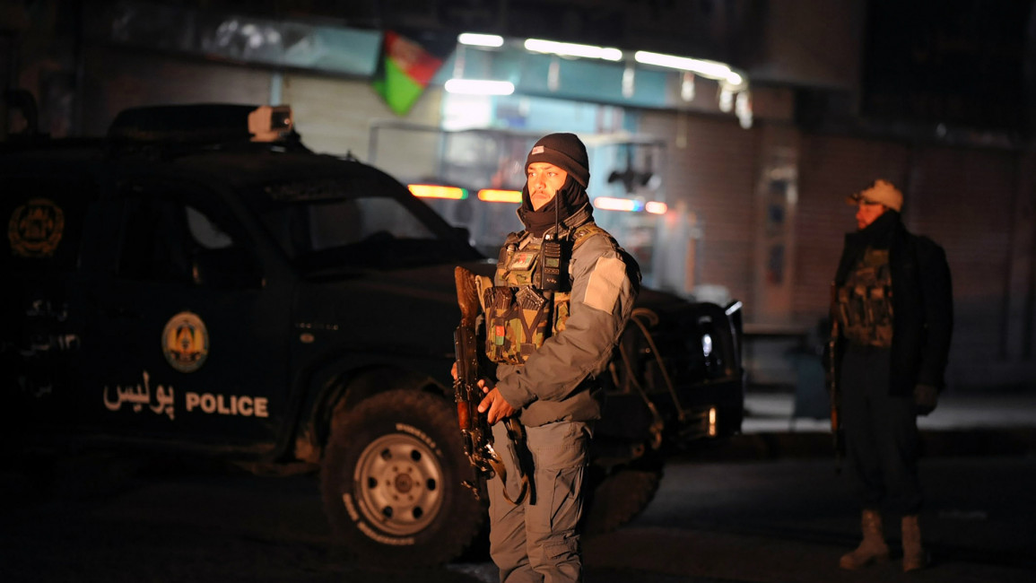 Afghan police after Kandahar attack