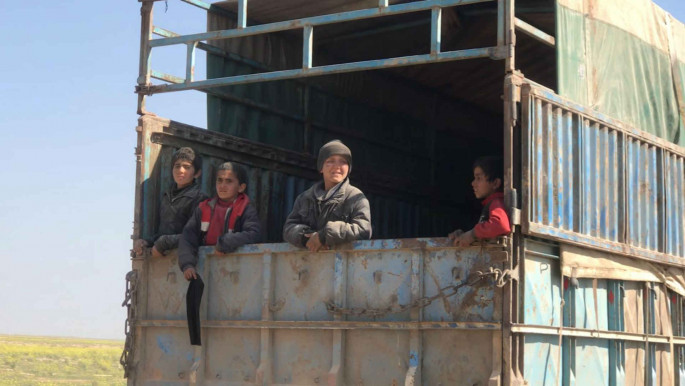Citizens evacuating the last IS enclave in eastern Syria